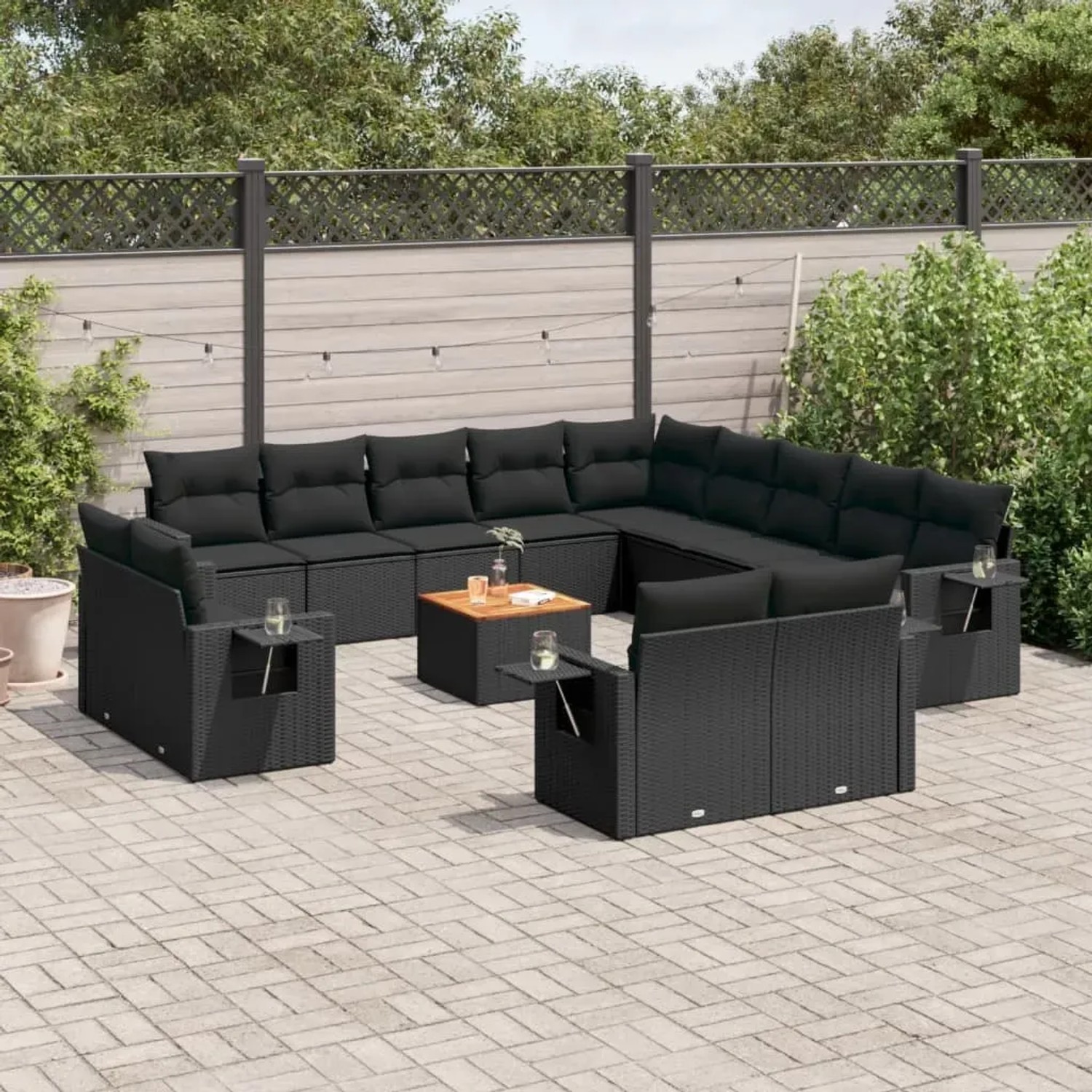 Schwarze 14-tlg. vidaXL Garten-Sofagarnitur aus Poly Rattan mit Kissen und Tisch.