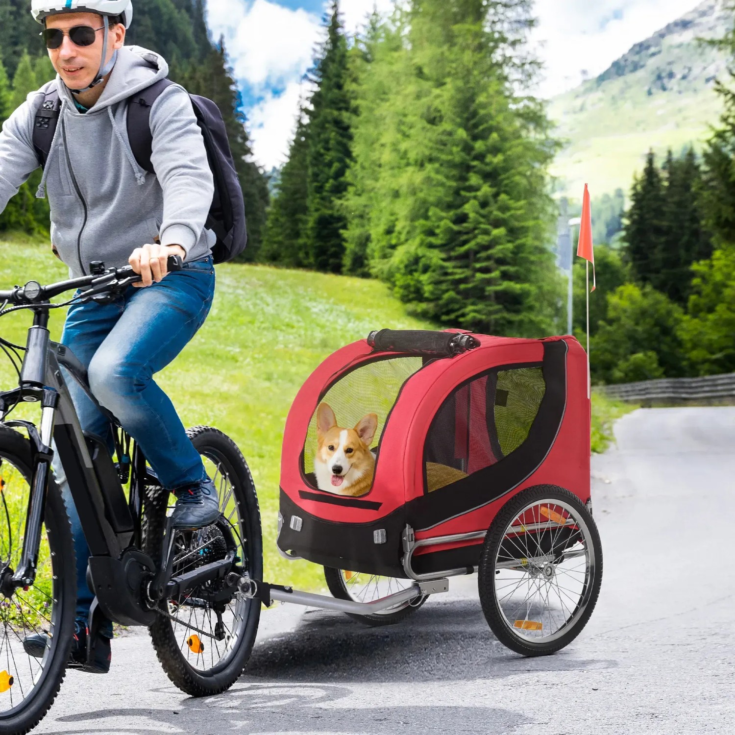 Roter PawHut Hundeanhänger am Fahrrad mit Hund. Ideal für sicheren Transport von Kleintieren.