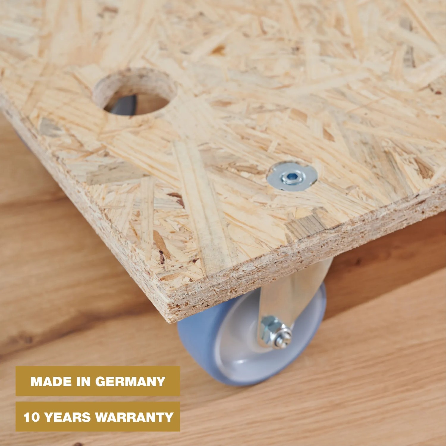 Wagner Transporthilfe mit OSB-Platte, 250 kg Tragkraft und blauen Rollen.