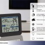 Schwarze TFA Funk-Wetterstation Sky mit Außensender zeigt Wettervorhersage, Temperatur und Luftfeuchtigkeit.