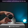 Weiße Philips Hue Secure Kamera mit Standfuß, kabelgebunden, für Innen- und Außenbereich.