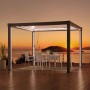 Anthrazitfarbene Sunjoy Multi-Pergola Matterhorn mit LED-Beleuchtung und Terrassenmöbeln bei Sonnenuntergang.