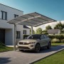Ximax Carport Portoforte-80 im Edelstahl-Look mit Auto. Moderner Metallcarport mit gebogenem Dach.