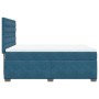 Blaues Boxspringbett (140x190 cm) mit Matratze und Samtbezug. Bett mit gestepptem Kopfteil.