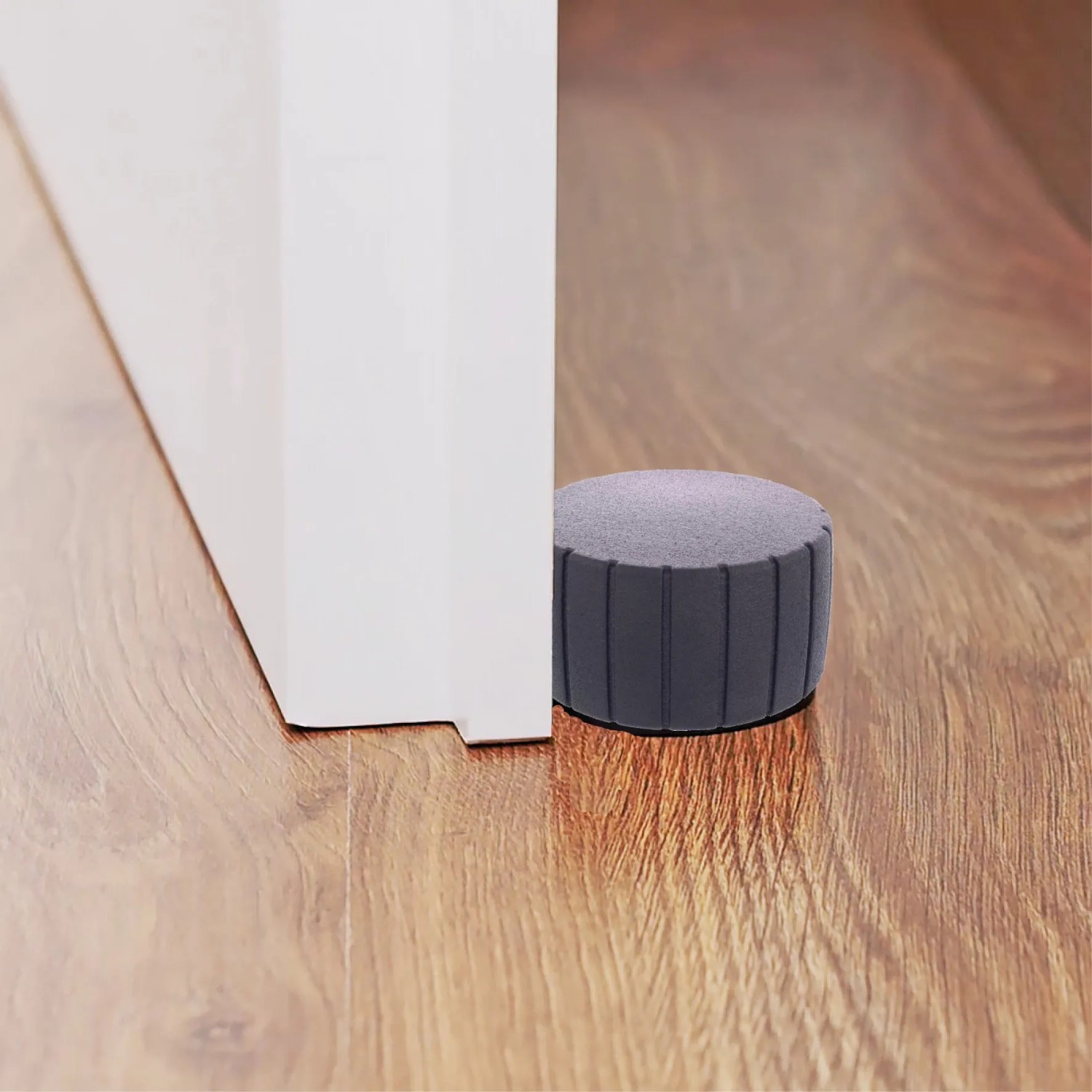 Schwarzer Wagner Türstopper Space aus Kautschuk, Ø 55 mm, schützt Tür und Wand.