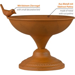 Dekorative Metall Vogeltränke mit Edelrost-Patina, ornamentiertem Sockel und kleinem Ziervogel.