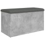 Sitzbank Betongrau mit Stauraum und dunklem Kissen, Möbel für Wohnzimmer oder Flur.