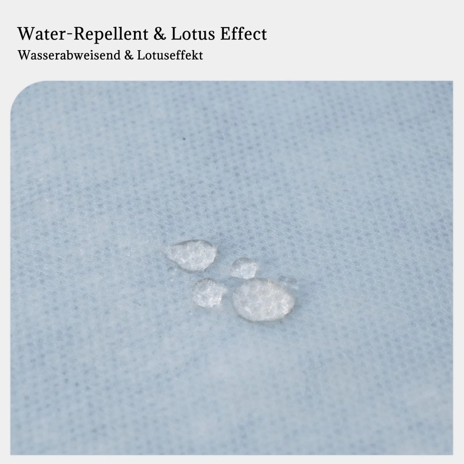 Wassertropfen auf weißer Vlies-Tischdeckenrolle demonstrieren den wasserabweisenden Lotuseffekt.