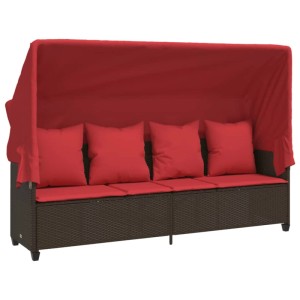 Braune vidaXL Sonnenliege mit Dach und roten Kissen aus Poly Rattan.