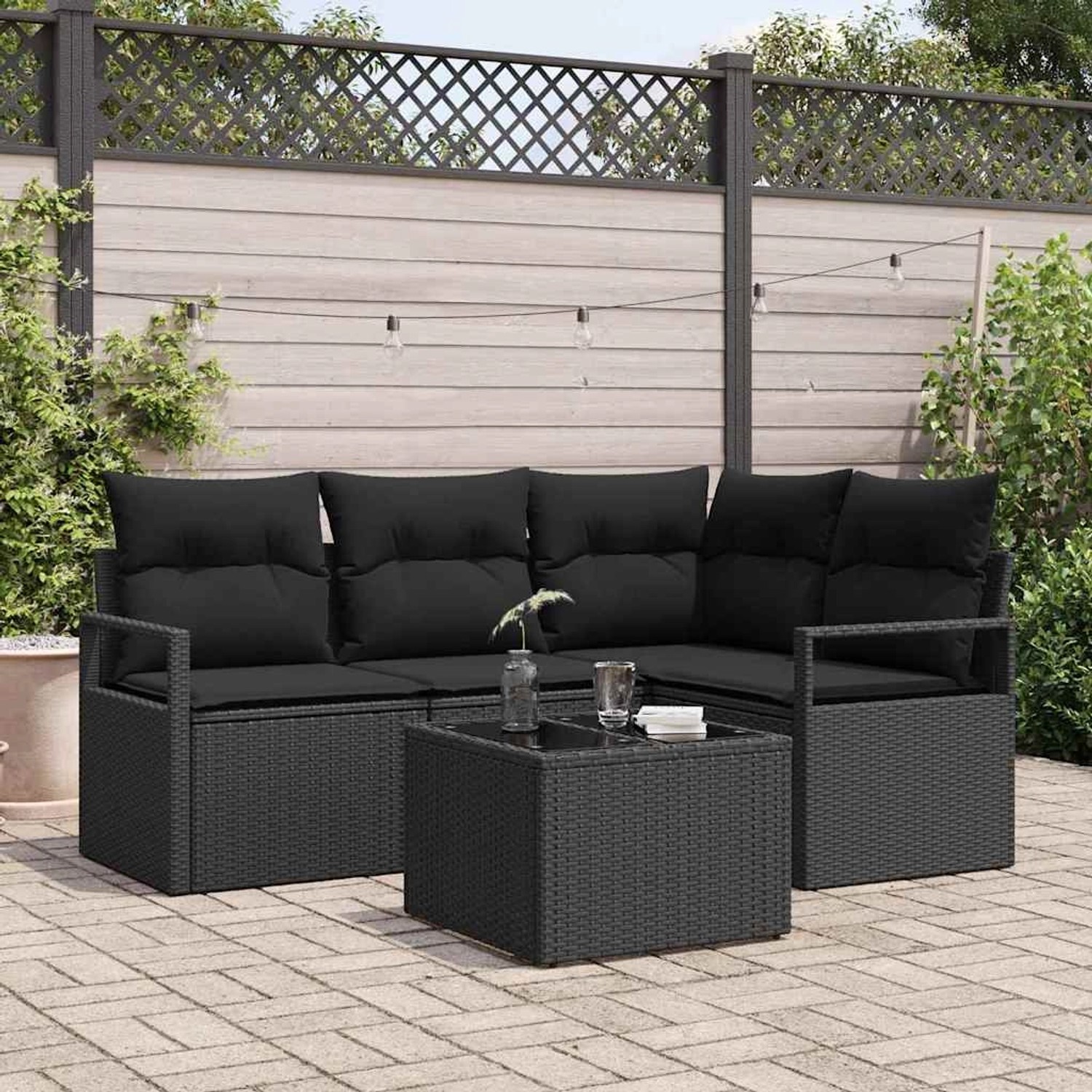 Schwarzes 5-teiliges Garten-Sofa-Set aus Poly Rattan mit Tisch für Terrasse und Garten.