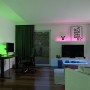 Wohnzimmer mit Paulmann SimpLED LED Strip COB, 1,5m, mehrfarbig, als Stimmungslicht.
