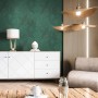 Dunkelgrüne Newroom Vliestapete Niama mit modernem Dschungel-Muster. Dekorative Tapete für Wohnzimmer.