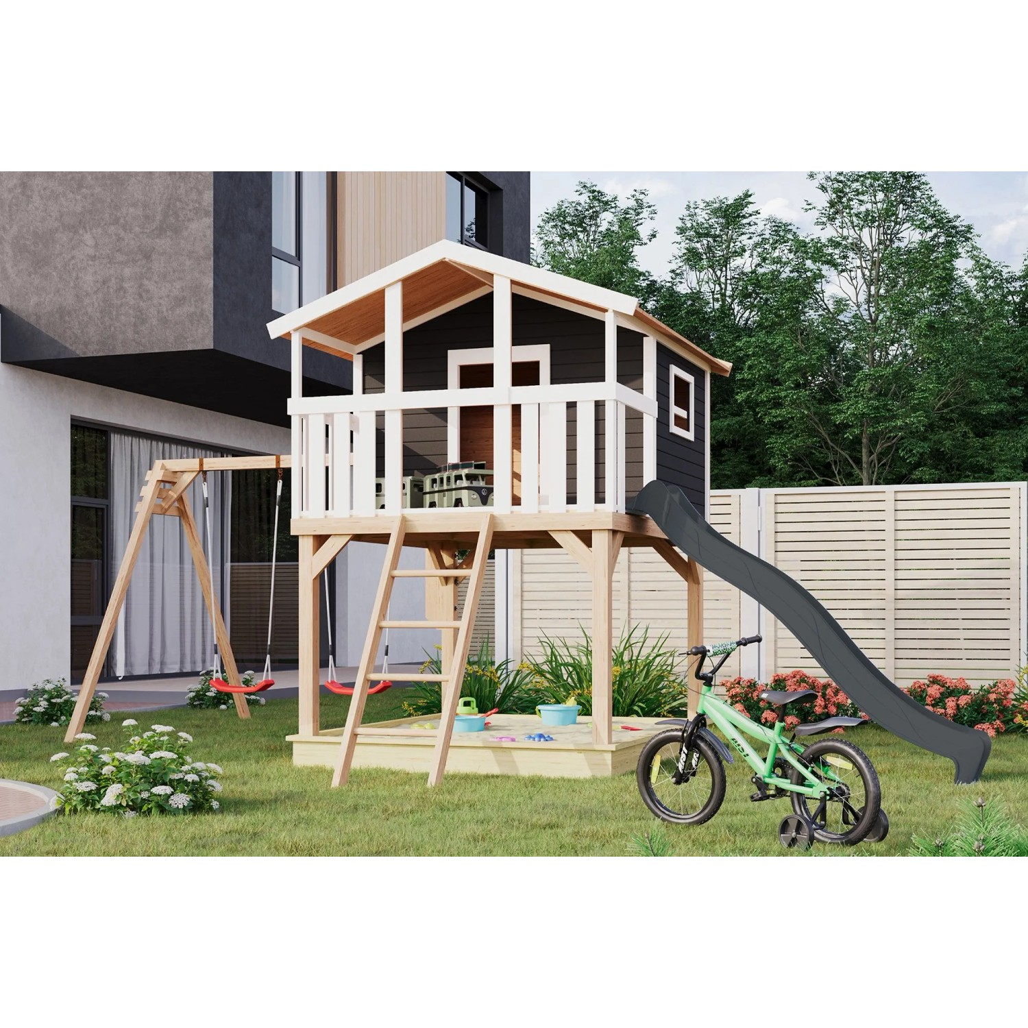 Karibu Stelzenhaus Benjamin mit Rutsche, Schaukel und Sandkasten im Garten.