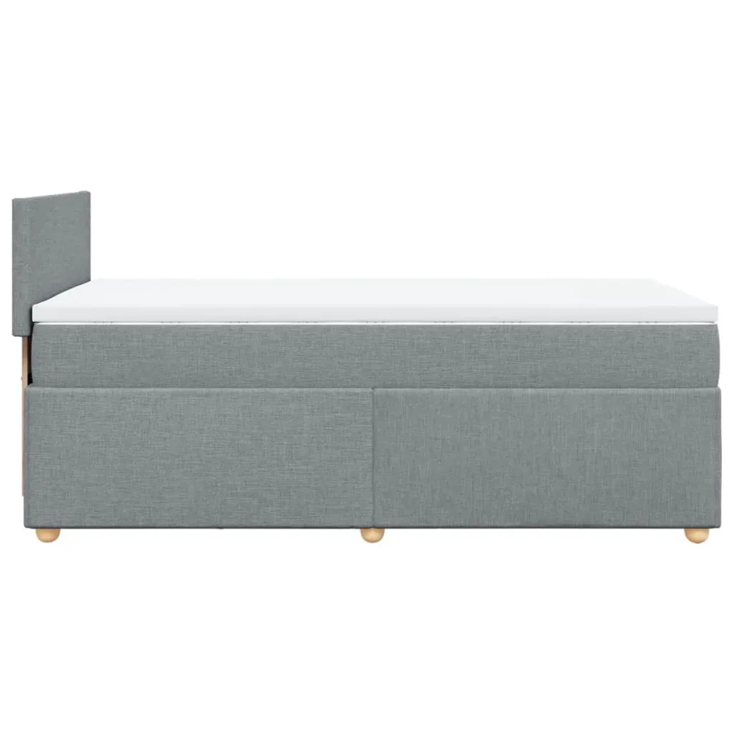 Helles Boxspringbett 90x200 cm mit Matratze und Kopfteil, grauer Stoffbezug.