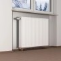 Raum mit Heizkörper und angebrachter Dämmtapete EPS alubeschichtet zur Wohnraumdämmung.