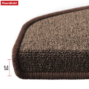 Detailaufnahme: Halbrund braune KARAT Stufenmatte London Pro, Teppichstruktur mit geketteltem Rand.