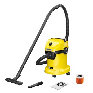 Gelber Kärcher Akku Nass-Trockensauger WD 3-18 mit Zubehör wie Düsen und Filter.
