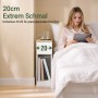 Schmaler weißer Nachttisch (20cm) mit Holzplatte, Ladestation, Sockelleisten-Aussparung und offenem Fach im Schlafzimmer.