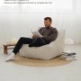 Beiger Cord Sitzsack Sessel „Der Lümmel“ XXL mit Mann beim Lesen. Bequemer Gartenstuhl.