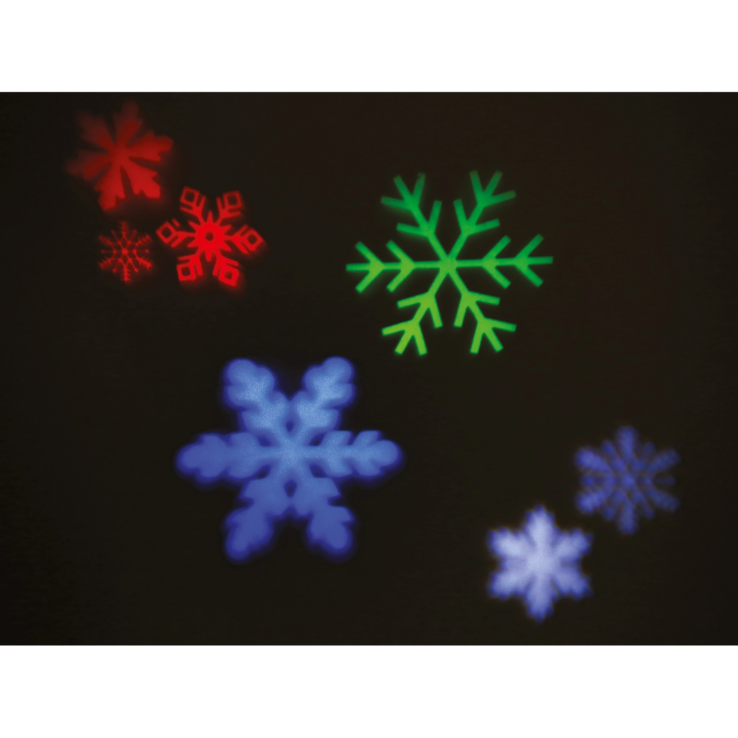 LED Projektor mit roten, grünen und blauen Schneeflocken für die Weihnachtsdekoration.