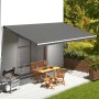 Anthrazitfarbene DELUKE Markisenbespannung 600x350 cm mit Volant als Ersatzstoff für eine Terrassenmarkise.