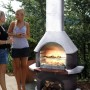 Buschbeck Gartengrillkamin San Remo in Weiß-Braun mit Grillrost und Holzfach.