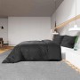 Schwarzes vidaXL Bettwäsche-Set (200x200 cm) aus Baumwolle auf einem Bett in einem Schlafzimmer.