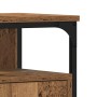 Waschbeckenunterschrank Altholz-Optik: Detail von Holzwerkstoff und schwarzem Stahlrahmen mit Nieten.