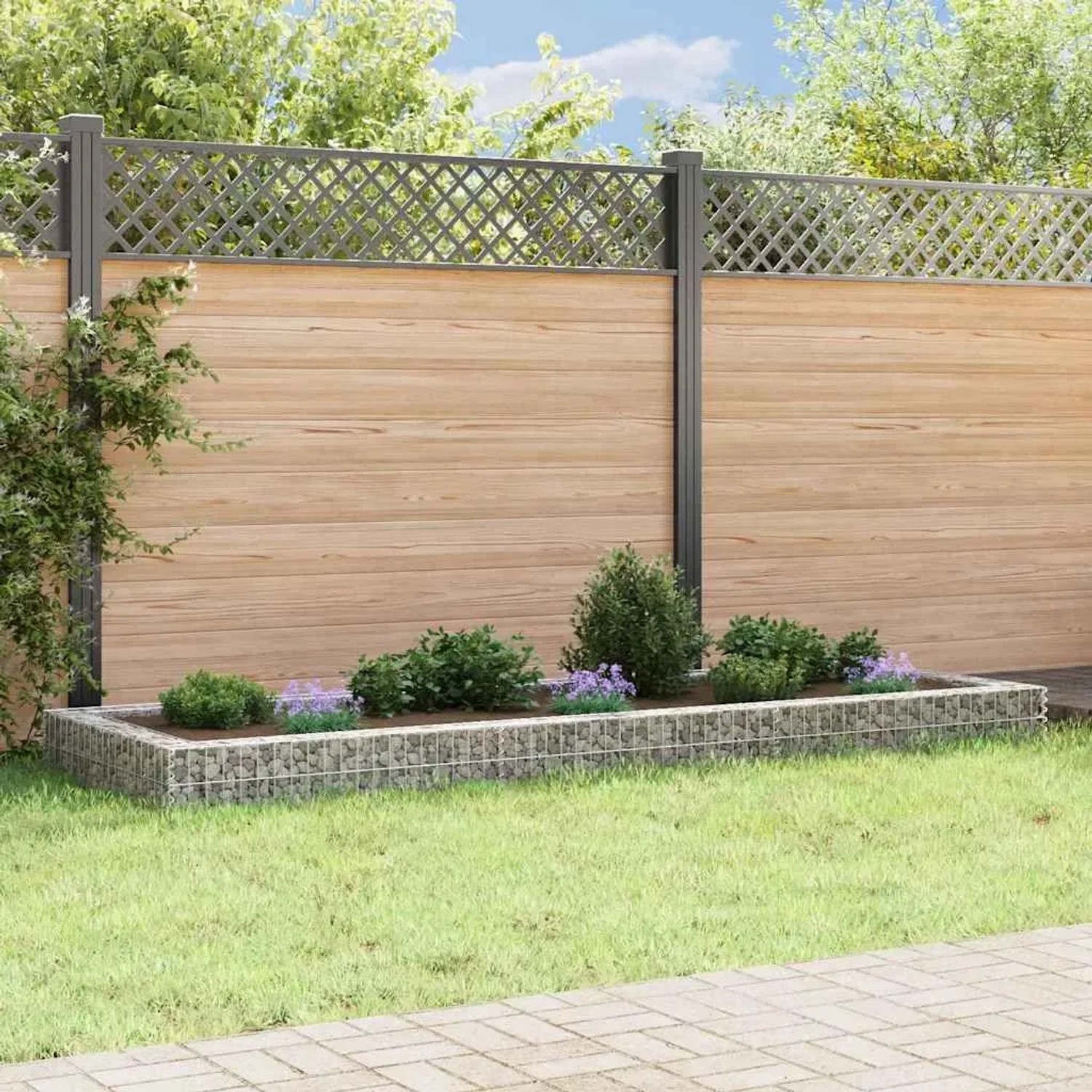 furnicato Gabionen-Hochbeet aus verzinktem Stahl, 300x100x20 cm, befüllt mit Steinen im Garten.