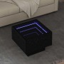 Quadratischer Couchtisch in Schwarz Eichen-Optik mit LED-Beleuchtung.