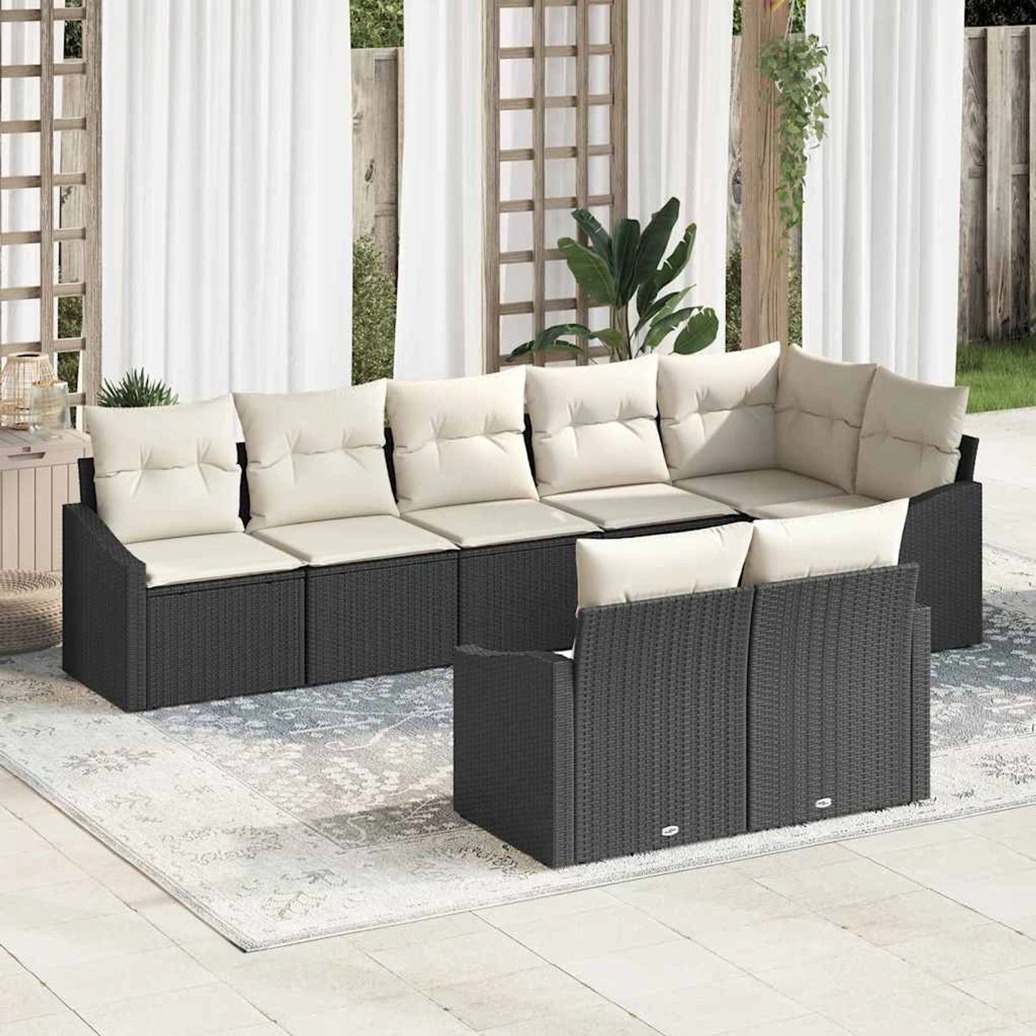 Schwarzes 8-tlg. vidaXL Garten-Sofa-Set aus Poly Rattan mit beigen Kissen.