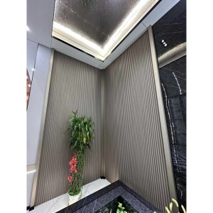 Colortree Akustikpaneele in Champagner-Metall-Optik als Wandverkleidung.