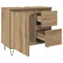 Waschbeckenunterschrank Artisan-Eiche aus Holzwerkstoff mit offenen Türen, Schubladen und Eisenbeinen für das Bad.