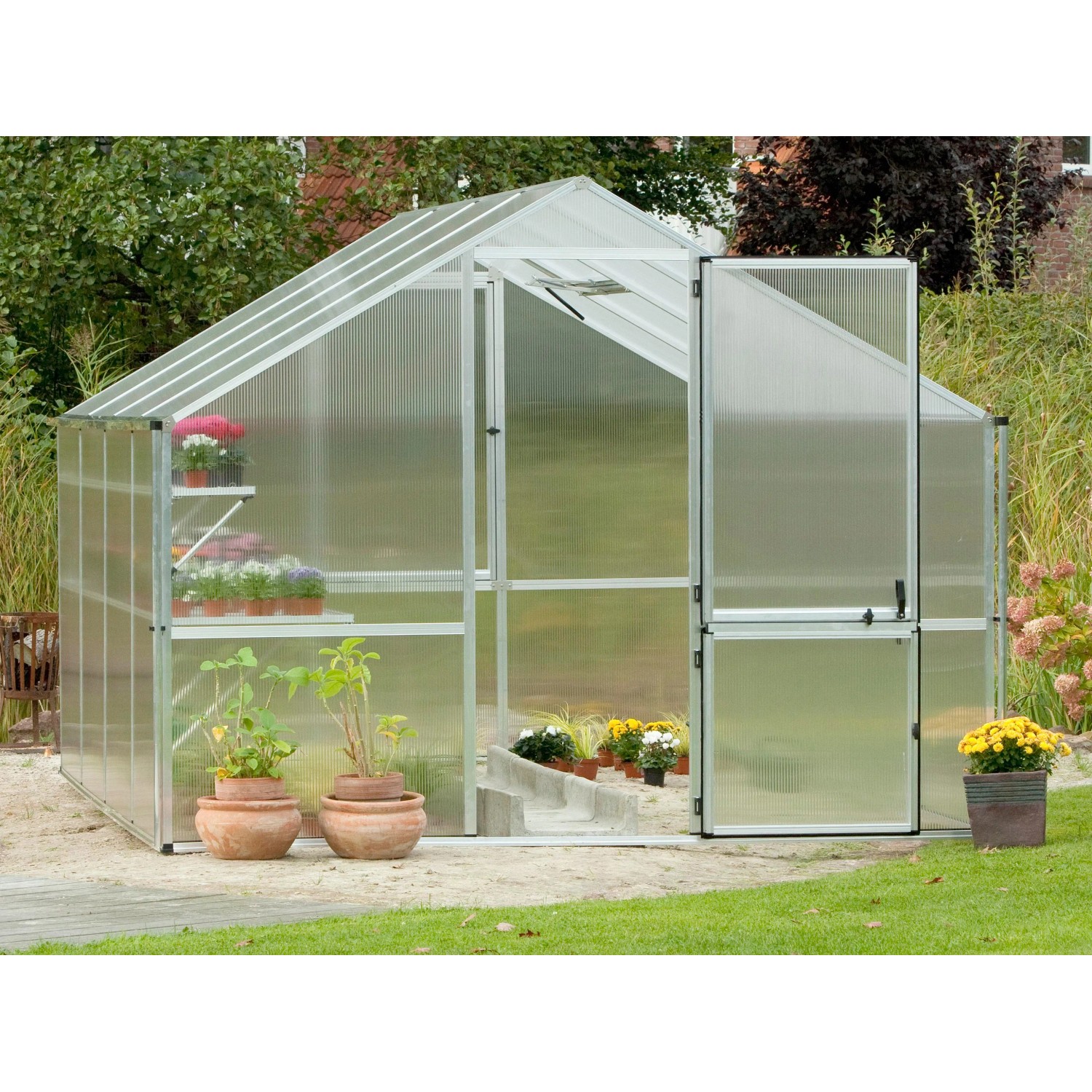 KGT Gewächshaus Orchidee Alu blank, 12,74 m², mit geöffneter Tür und Pflanzen.