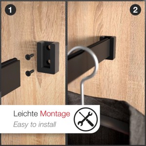 Schwarze, matt lackierte Schrankstangenlager in zwei Montageschritten an Holz gezeigt. Einfache Befestigung für Schrankrohr.