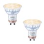 Zwei Philips Smart-LED-Leuchtmittel GU10, weiß-roségold, dimmbar, für warm- bis kaltweißes Licht, WiZ App steuerbar.