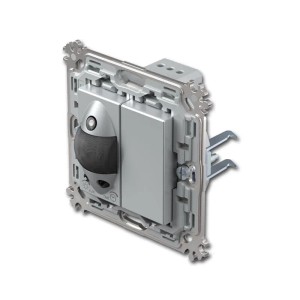 Silberner TEM MODUL PLUS Bewegungsmelder UP. IR-Schalter mit schwarzer Linse und Montageelementen für Unterputzinstallation.