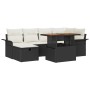 7-teilige Gartensofagarnitur aus Poly Rattan in Schwarz mit Tisch und Kissen.