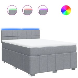 Hellgraues vidaXL Boxspringbett 140x190 cm mit LED-Beleuchtung am Kopfteil.