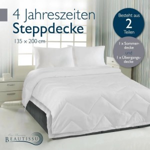 Weiße Beautissu 4 Jahreszeiten Bettdecke 135x200cm, gesteppt, als 2-teiliges Duo-Set auf einem Bett.