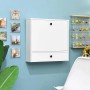Weißer Costway Wandklapptisch mit Schublade und Ablagefächern, geschlossen an blauer Wand. Ideal als platzsparender Schreibtisch.