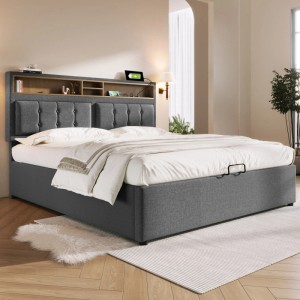 Graues Polsterbett 160x200 mit Bettkasten, USB-Ladefunktion und Ablagefächern im Kopfteil.