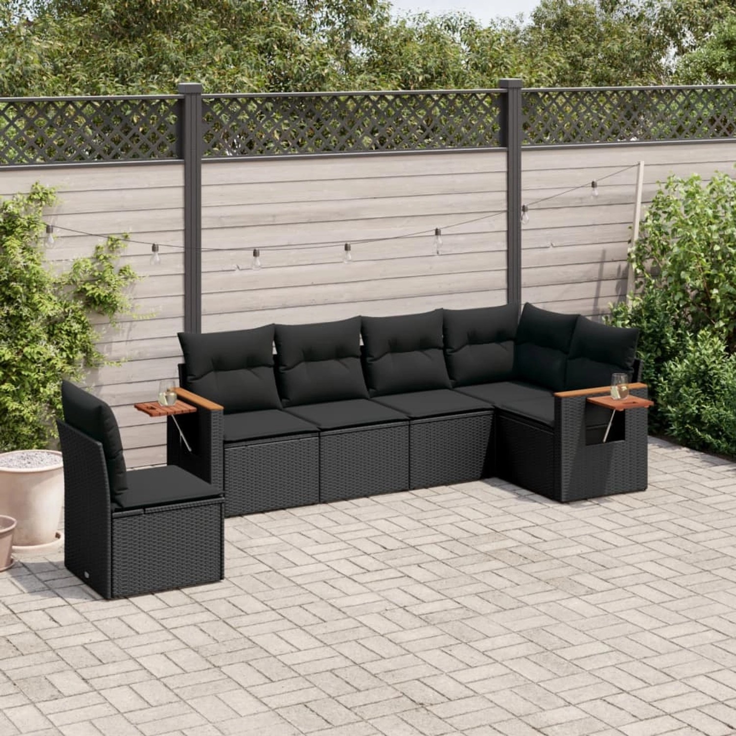 Schwarze 6-tlg. vidaXL Garten-Sofagarnitur aus Poly Rattan mit Kissen.