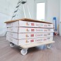 Wagner Transporthilfe Allrounder Birke mit Kartons auf Rollen. Tragkraft 250 kg.