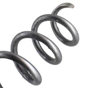 Detailansicht des spiralförmigen Löwenzahnzieher-Kopfes aus geschmiedetem Borstahl. Gartenhandgerät.