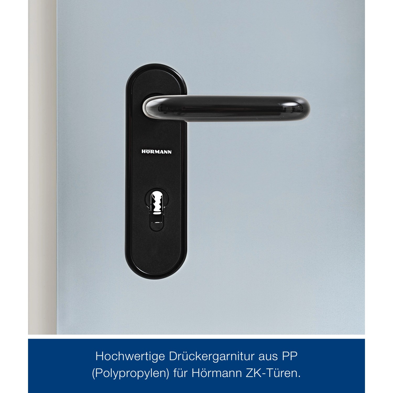 Schwarze Drückergarnitur für ZK-Tür-Element, Detailaufnahme.