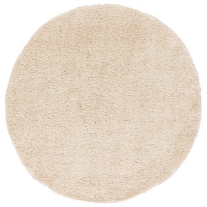 Runder, beiger Hochflor-Teppich Aloha von Pergamon, 150 cm Durchmesser.