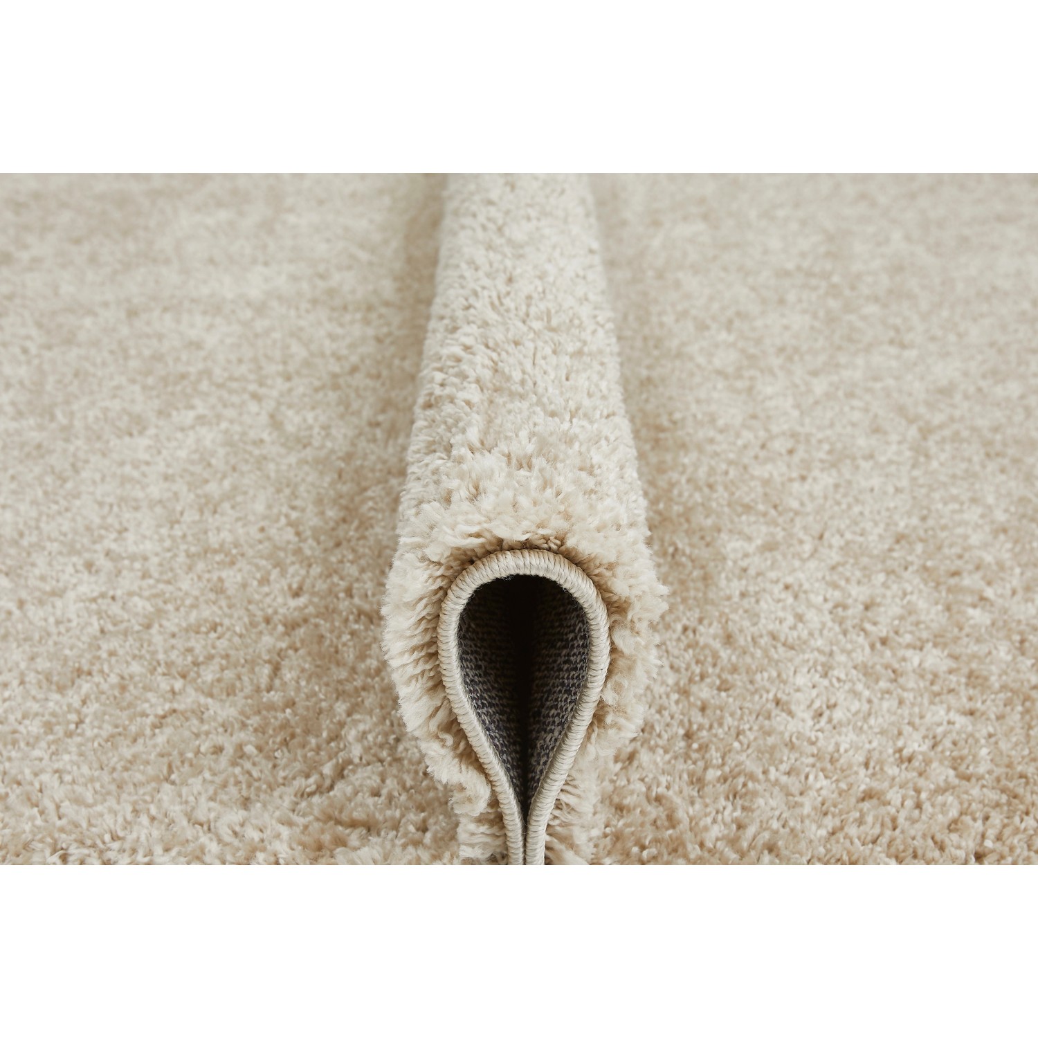 Beiger Andiamo Teppich Chia, 60x110 cm, mit hochflorigem, kuscheligem Flor. Moderner Teppich für Wohnräume.