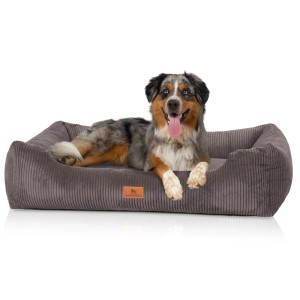 Braungraues Knuffelwuff Hundebett Olivia Cord XL mit Hund im Körbchen.
