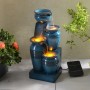 Blauer 4-stufiger Gartenbrunnen mit LED-Beleuchtung und Solarpanel. Dekorative Kaskade für den Außenbereich.